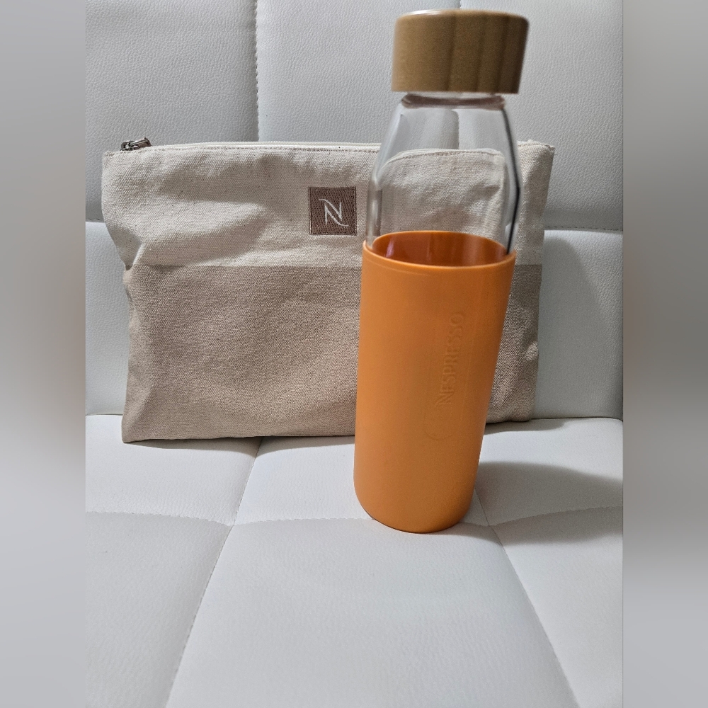 Nespresso Glass Bottle with Vibrant Orange Sleeve